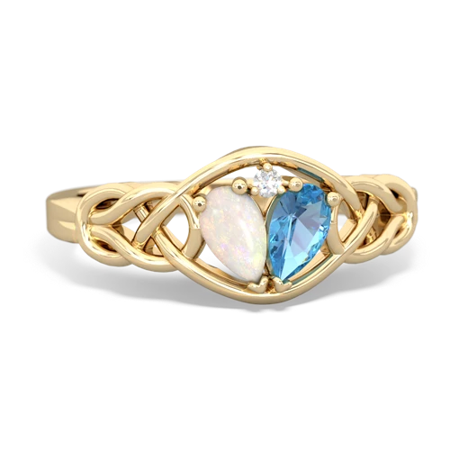 opal-blue topaz celtic knot ring