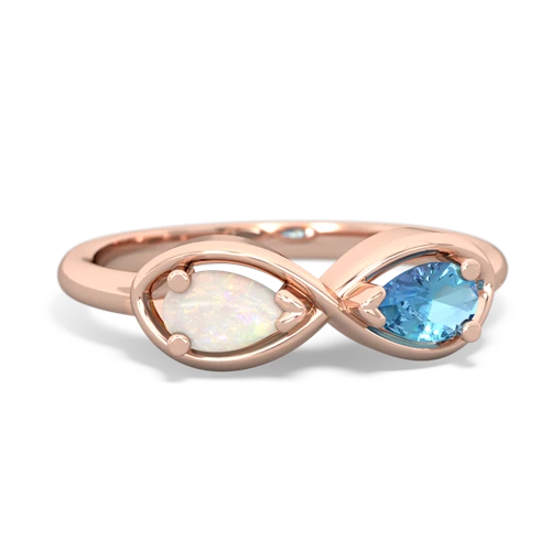 opal-blue topaz infinity ring