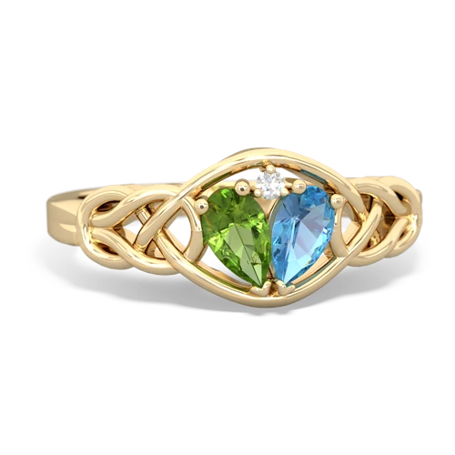 peridot-blue topaz celtic knot ring