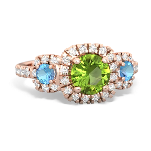 peridot-blue topaz three stone regal ring