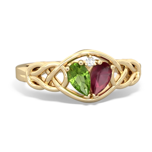 peridot-ruby celtic knot ring
