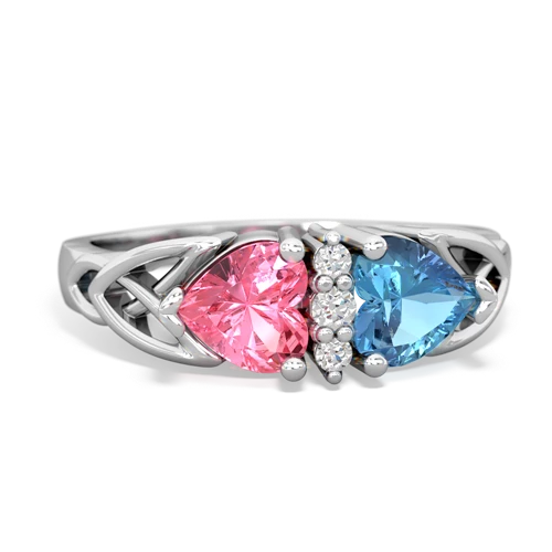 pink sapphire-blue topaz celtic ring