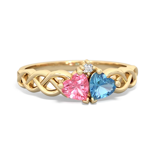 pink sapphire-blue topaz celtic braid ring