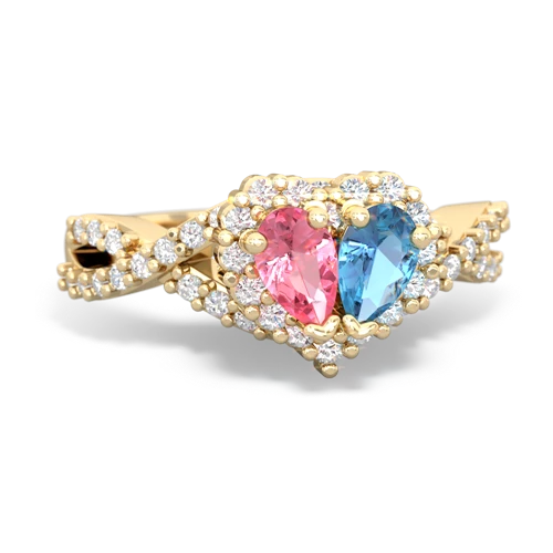 pink sapphire-blue topaz engagement ring