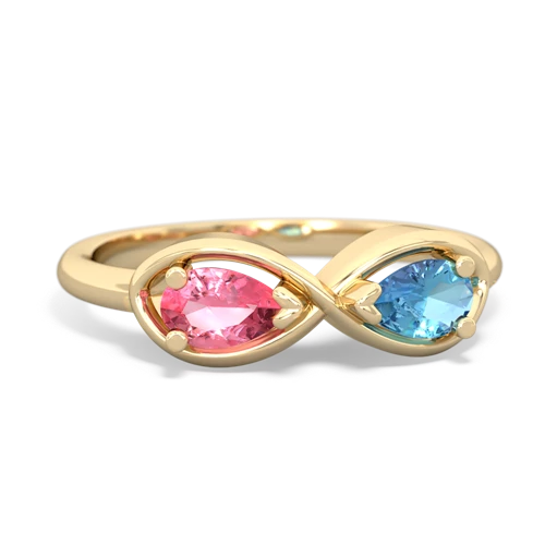 pink sapphire-blue topaz infinity ring