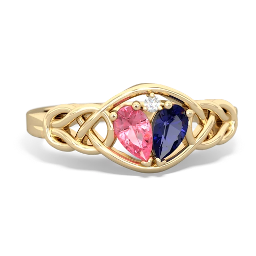 pink sapphire-lab sapphire celtic knot ring