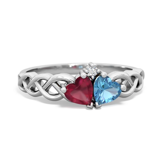 ruby-blue topaz celtic braid ring