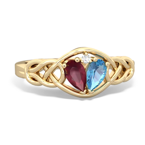ruby-blue topaz celtic knot ring