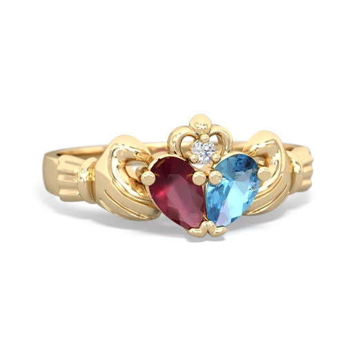 ruby-blue topaz claddagh ring