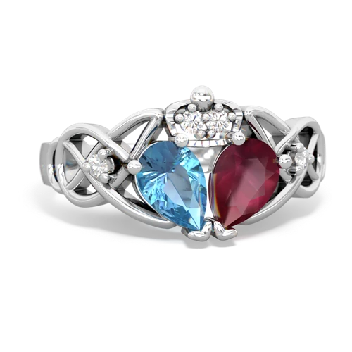 ruby-blue topaz claddagh ring