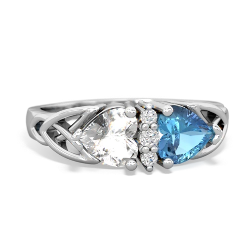 white topaz-blue topaz celtic ring