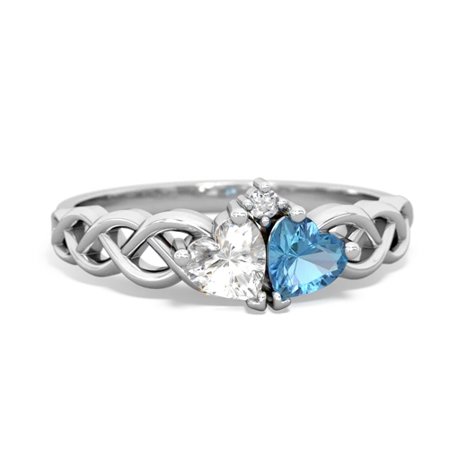 white topaz-blue topaz celtic braid ring