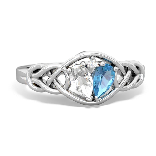 white topaz-blue topaz celtic knot ring