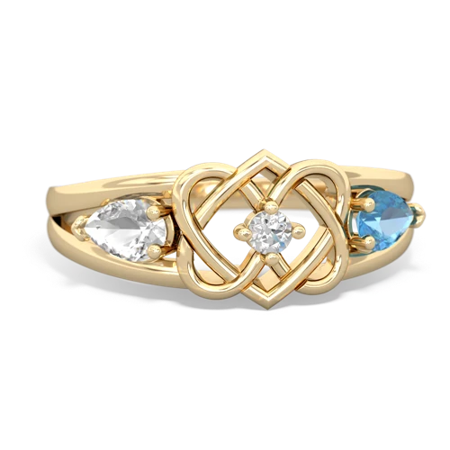 white topaz-blue topaz double heart ring