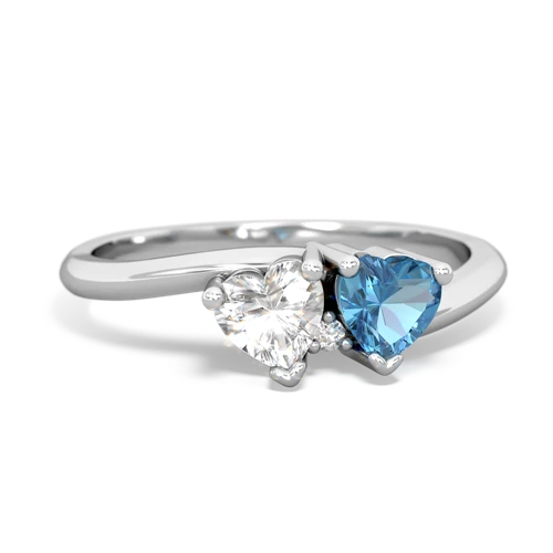 white topaz-blue topaz sweethearts promise ring