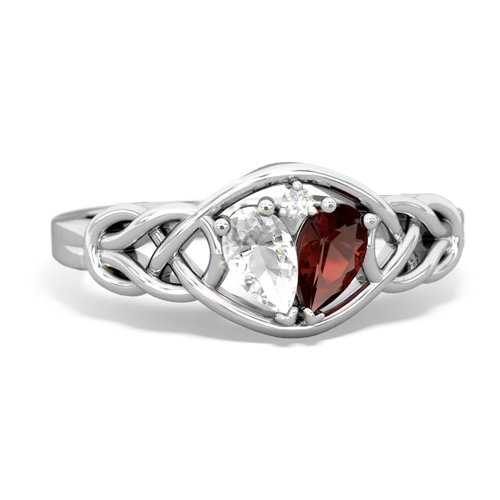 white topaz-garnet celtic knot ring