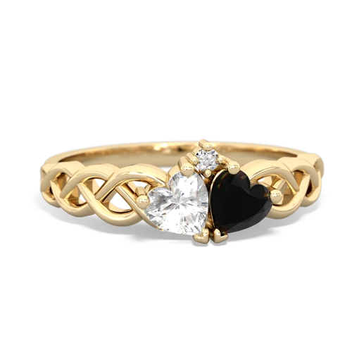 white topaz-onyx celtic braid ring