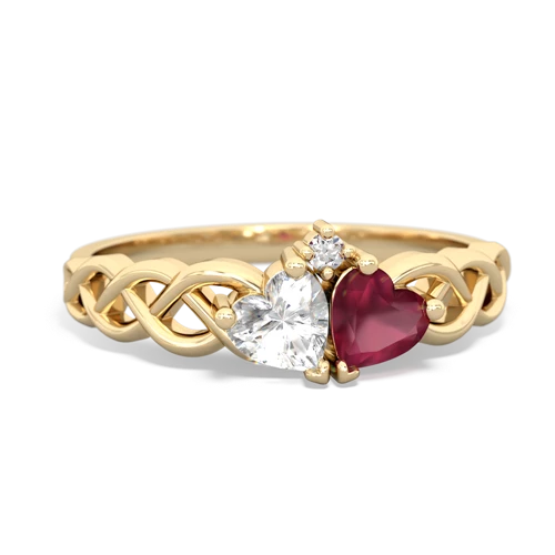 white topaz-ruby celtic braid ring