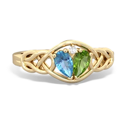 Blue Topaz Celtic Love Knot 14K Yellow Gold ring R5420