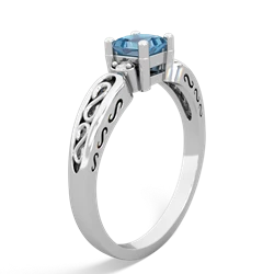 blue_topaz filigree rings